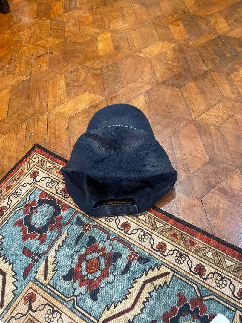 Balenciaga Cap (Category: Caps & Hats) located in Pasig City. Submitted by paulclzdo (Listing ID 1461020090, Image 3). Description: - Navy blue Balenciaga cap - Features classic Balenciaga logo on the front - Adjustable strap at the back for a custom fit - Ideal for everyday styling.