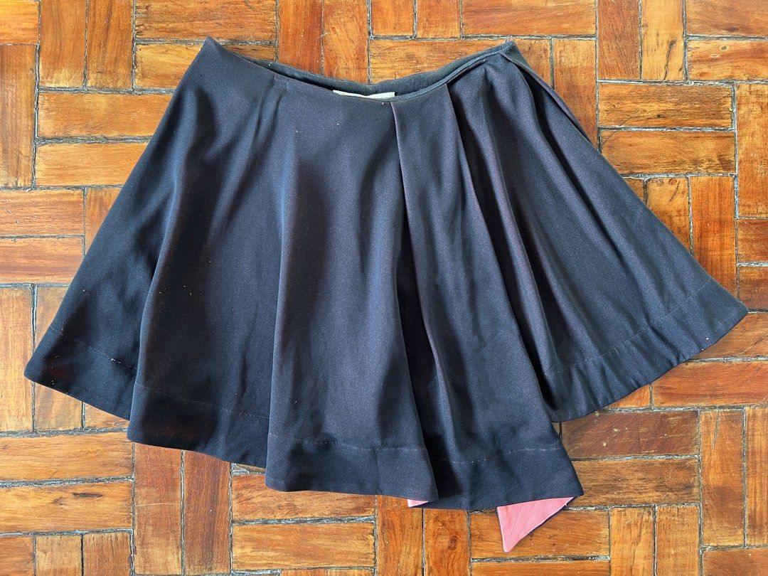 Balenciaga Spring 2013 tech skirt (Category: Luxury Apparel) located in Quezon City. Submitted by raccoonfur (Listing ID 1460960880, Image 2). Description: Balenciaga by Nicolas Ghesquiere Spring 2013 pleated skirt. His last collection for Balenciaga. Has some tiny holes and snags. Retro punk vibes. Flat measurement: Waist 37cm Length 43cm.