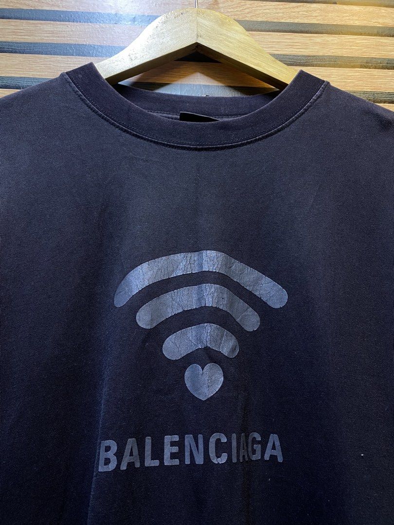 BALENCIAGA “WIFI TEE” (Category: Tshirts & Polo Shirts ) located in Makati City. Submitted by drip.poww (Listing ID 1461091407, Image 3). Description: - Authentic Balenciaga - Color: Black - Size: XL - Dimes: 25x31 - Authentic - Excellent condition - Need wash, fresh from bale - Material: 100% Cotton Please don’t expect too much—these are thrifted (ukay) items. 😊 !!STILL NEGOTIABLE!!.