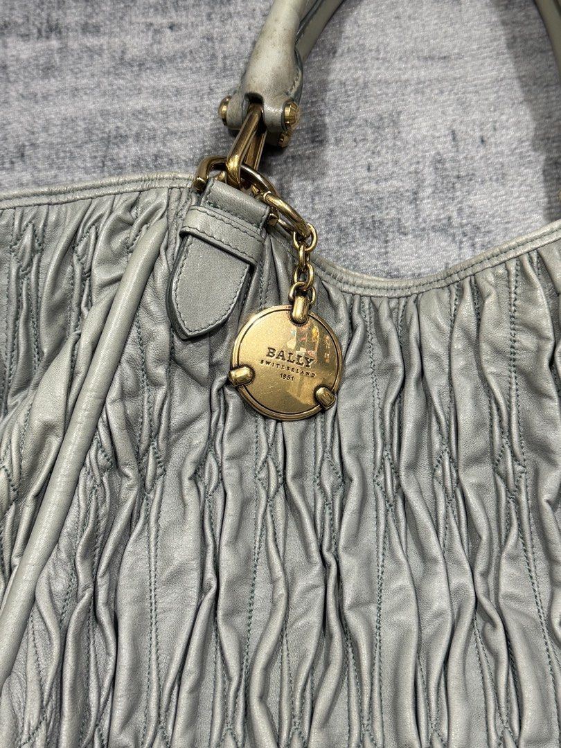 Bally - Ruched Leather Shoulder Bag (Category: Luxury Bags & Wallets) located in Manila. Submitted by members-only (Listing ID 1461079283, Image 3). Description: Vintage Bally Ruched Leather Shoulder Bag Gold Hardware Made In Italy In good condition Flaws: stain in handle strap only (check pics) No issue Authentic & Presentable Can send more pics thru direct message.