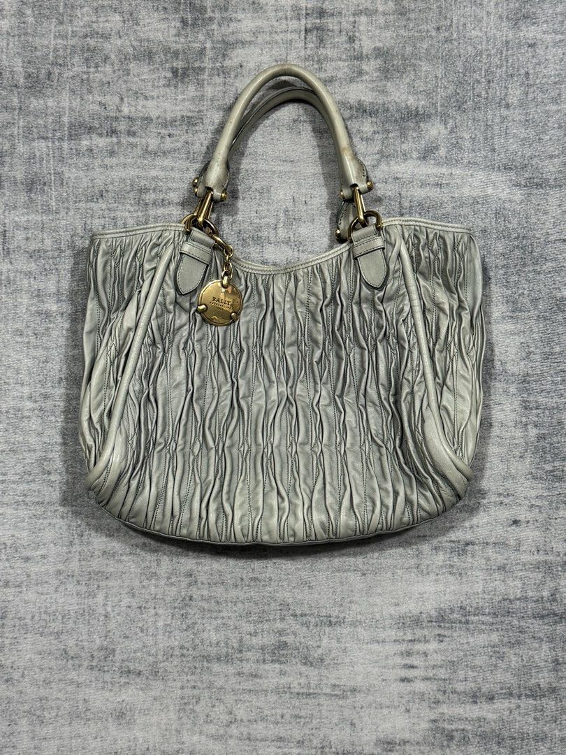 Bally - Ruched Leather Shoulder Bag (Category: Luxury Bags & Wallets) located in Manila. Submitted by members-only (Listing ID 1461079283, Image 1). Description: Vintage Bally Ruched Leather Shoulder Bag Gold Hardware Made In Italy In good condition Flaws: stain in handle strap only (check pics) No issue Authentic & Presentable Can send more pics thru direct message.