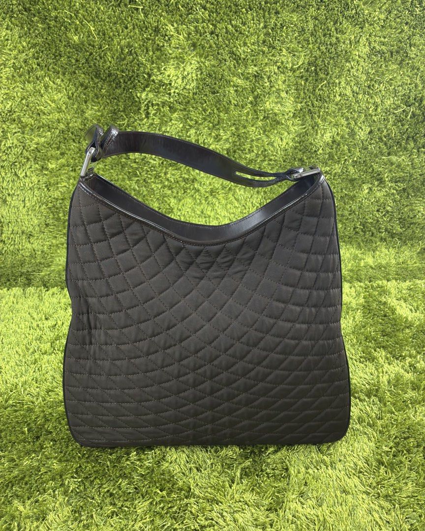 BALLY Black Leather Quilted Fabric Shoulder Bag (Category: Luxury Bags & Wallets) located in Lucena. Submitted by shopdotmane (Listing ID 1461063232, Image 1). Description: BALLY Black Leather Quilted Fabric Shoulder Bag Classic Design Silver Hardware Condition: Excellent Very presentable Needs minor cleaning only on quilted fabric .