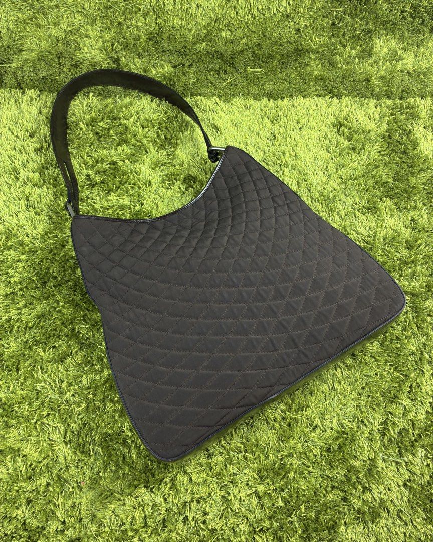 BALLY Black Leather Quilted Fabric Shoulder Bag (Category: Luxury Bags & Wallets) located in Lucena. Submitted by shopdotmane (Listing ID 1461063232, Image 2). Description: BALLY Black Leather Quilted Fabric Shoulder Bag Classic Design Silver Hardware Condition: Excellent Very presentable Needs minor cleaning only on quilted fabric .