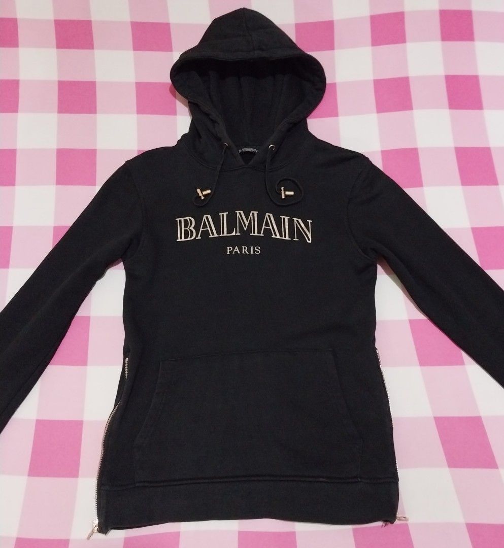 Balmain hoodie jacket (Category: Coats, Jackets and Outerwear) located in Manila. Submitted by PrinceDani.Clothing (Listing ID 1461096665, Image 3). Description: balmain black hoodie jacket xs on tag fit up to medium 18in width 25in length excellent condition .