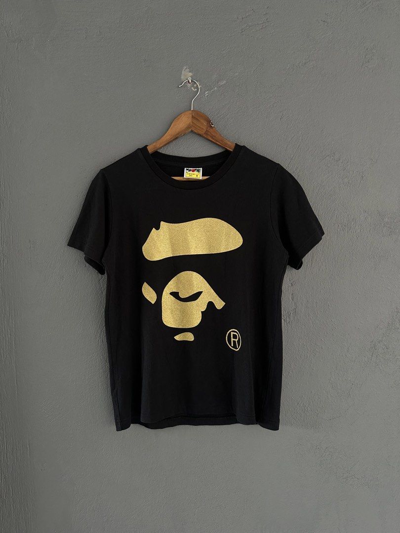 Bape - Ladies Glitter Ape Face tee (Category: Shirts) located in Pasig City. Submitted by worn2wice (Listing ID 1461010887, Image 1). Description: Size Small Measurements (in) Width 19 Length 25 Sleeve Length 7.5 Excellent condition No copyright infringement intended. This post is for resale purposes only. All trademarks, logos, and brand names belong to their respective owners..
