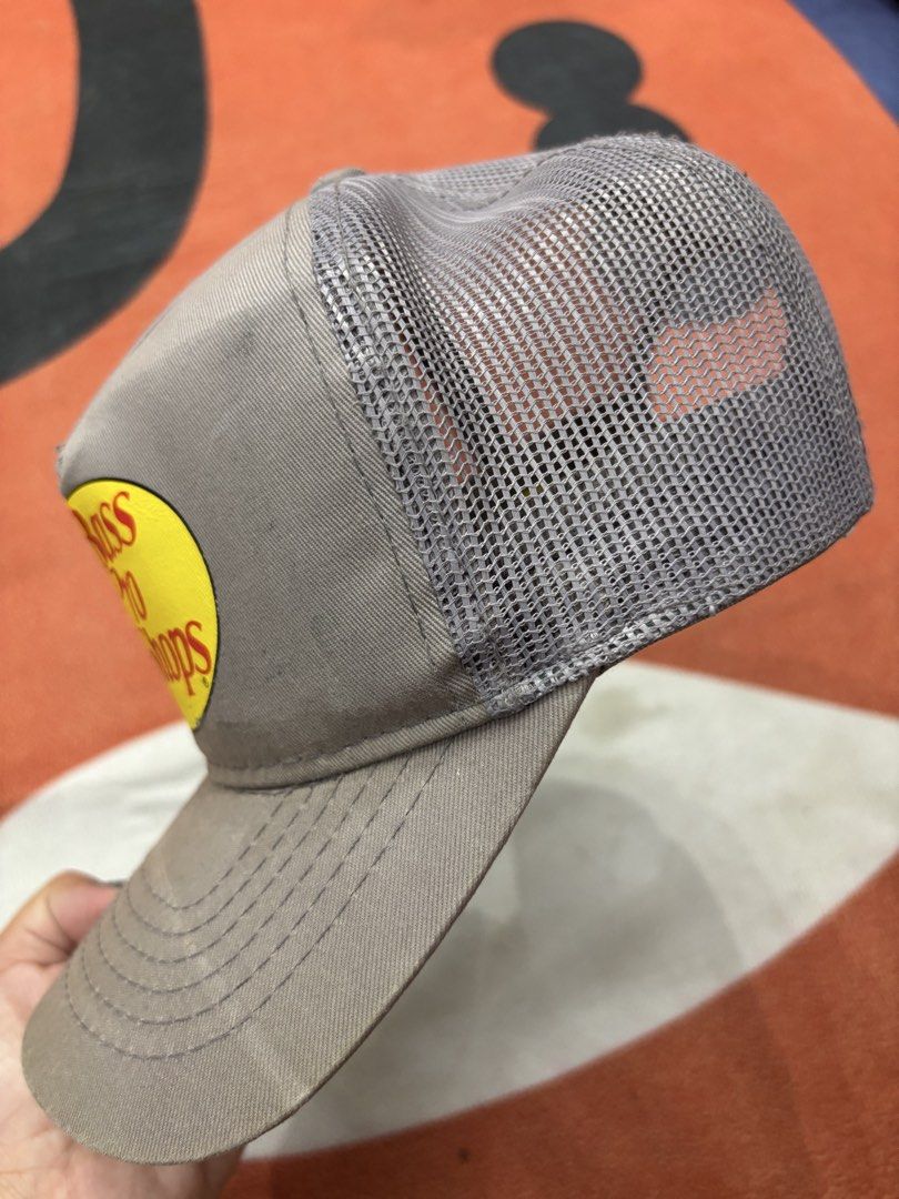 Bass Pro Shops Trucker Cap Hat (Category: Caps & Hats) located in Alicia. Submitted by thriftbagph (Listing ID 1461078588, Image 2). Description: - Grey Bass Pro Shops trucker cap - Breathable mesh back - Adjustable snapback closure - Perfect for fishing trips or casual wear - Shows minor signs of wear on the brim.