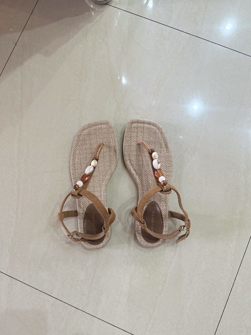 Beach bohemian toe thong sandals (Category: Sandals) located in Valencia. Submitted by kimbeegals (Listing ID 1460983673, Image 3). Description: No flaws or dumi. Bought this for almost 700php including sf. I only used this once, I used it for an event lang. Super bago pa nito swear. With box US 8 Very comfy yung soles, di masakit sa toes yung strap. Super cute ng design, I love the beads na shells sa strap. .