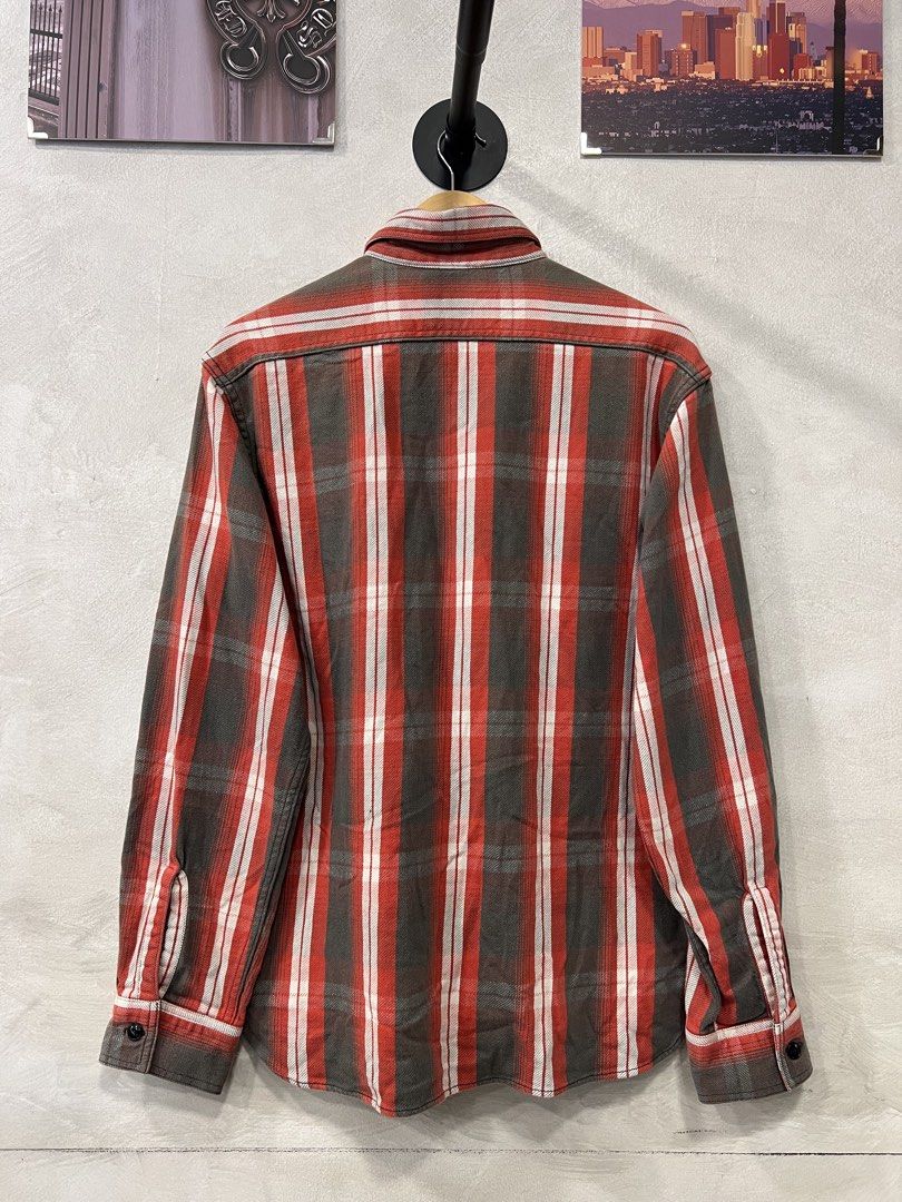 Beams Work Clothing Beams Casual Button down shirt (Category: Tshirts & Polo Shirts ) located in Manila. Submitted by -handpick- (Listing ID 1461020924, Image 2). Description: The featured item is a vintage-style plaid flannel work shirt from the Japanese label Beams. Known for its high-quality construction and classic Americana-inspired aesthetics, this piece showcases a rugged check pattern in red, charcoal grey, and white, complete with distin
