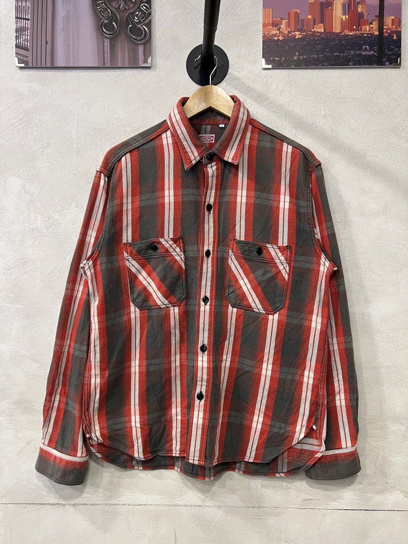 Beams Work Clothing Beams Casual Button down shirt (Category: Tshirts & Polo Shirts ) located in Manila. Submitted by -handpick- (Listing ID 1461020924, Image 1). Description: The featured item is a vintage-style plaid flannel work shirt from the Japanese label Beams. Known for its high-quality construction and classic Americana-inspired aesthetics, this piece showcases a rugged check pattern in red, charcoal grey, and white, complete with distin