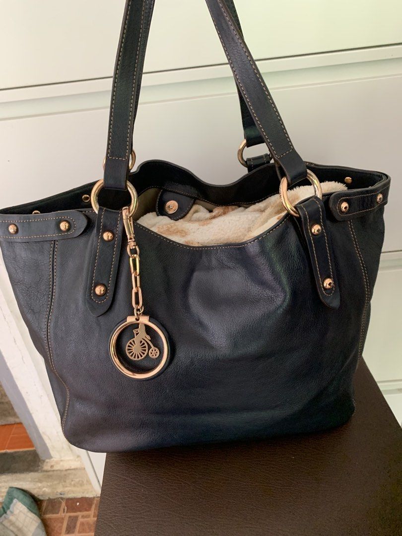 Bean Pole Black Leather Tote Bag with Gold Hardware (Category: Tote Bags) located in Taguig. Submitted by madisam (Listing ID 1460972147, Image 3). Description: Like new Original Beanpole Size Height:12 inches Widht:19 inches .