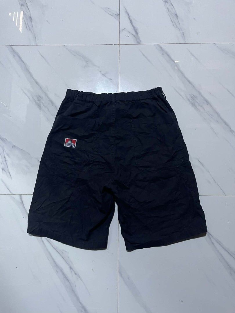 Ben Davis Black Cargo Shorts Size M (Category: Shorts) located in Pangantucan. Submitted by calmwhale_cb83a8 (Listing ID 1460947315, Image 1). Description: - Black Ben Davis - Size: Medium (M-L) - issue above zip one female button lock need repair or replace - Features an elastic waistband with a drawstring for adjustable comfort - Convenient side and back pockets for essentials - Unique inner lining with an all-over Ben Davis print - Ideal for c