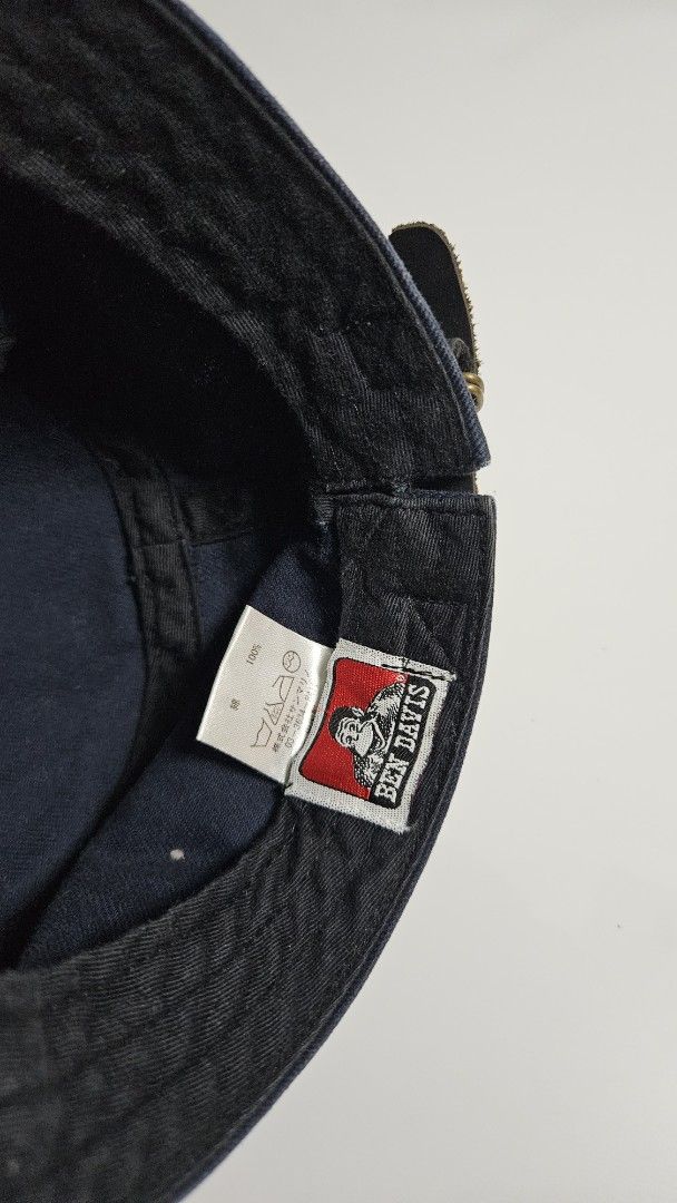 Ben Davis Cap Navy Blue Adjustable Strap (Category: Caps & Hats) located in Alfonso. Submitted by jbcamet (Listing ID 1461035859, Image 3). Description: - Classic navy blue cap from Ben Davis - Features the iconic Ben Davis logo on the side - Adjustable strap at the back for a customized fit - Made from durable material for long-lasting wear - Perfect for everyday style and comfort.