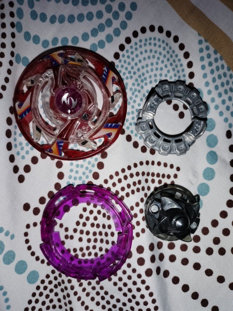Beyblade Maximum garuda red (Category: Action & Battle Toys) located in Manila. Submitted by jawaje67 (Listing ID 1461073268, Image 1). Description: Well used, driver is not sharp anymore but still playable.