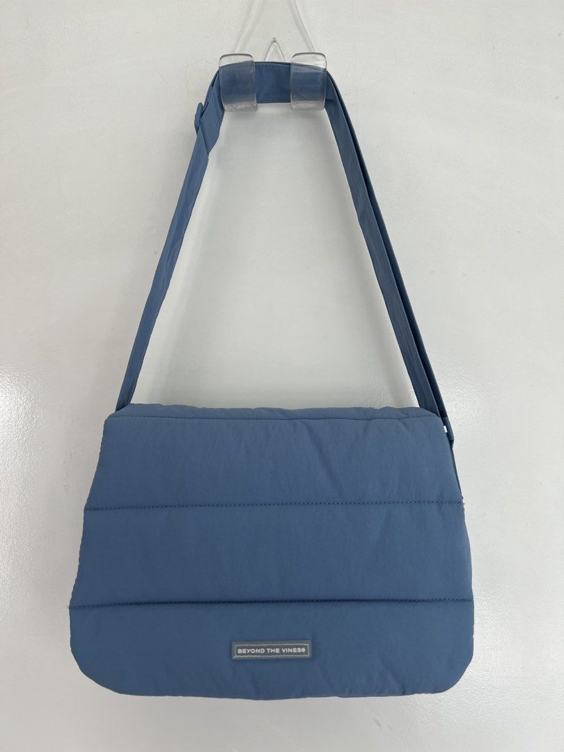 Beyond the Vibes Poofy Bag (Periwinkle) (Category: Shoulder Bags) located in Makati City. Submitted by hereasysupply (Listing ID 1460963354, Image 1). Description: *removable pouch not included anymore Made from water resistant nylon, this Poofy Bag can be carried on the shoulder or as a cross body bag by adjusting the straps, making it a versatile piece for casual days or formal evenings. Designed with a front flap with a magnetic closure, this 