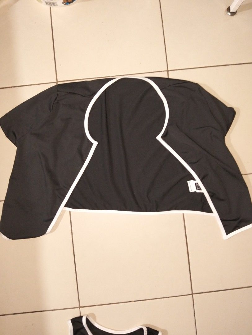 Black Athletic Crop Top and Jacket Set with White Trim (Category: Activewear) located in Manila. Submitted by oddhorse_8ada97 (Listing ID 1460987373, Image 3). Description: - Sleek black athletic set - Includes sleeveless crop top and cropped jacket - Features stylish white trim detailing on both pieces - Versatile for workouts or casual wear - Comfortable and fashionable - Creates a coordinated, matching set look - Ideal for an active lifestyle.