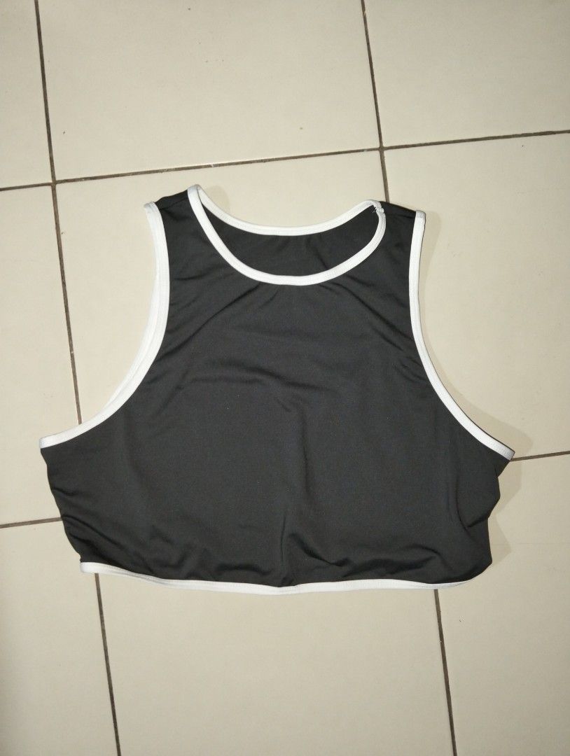 Black Athletic Crop Top and Jacket Set with White Trim (Category: Activewear) located in Manila. Submitted by oddhorse_8ada97 (Listing ID 1460987373, Image 2). Description: - Sleek black athletic set - Includes sleeveless crop top and cropped jacket - Features stylish white trim detailing on both pieces - Versatile for workouts or casual wear - Comfortable and fashionable - Creates a coordinated, matching set look - Ideal for an active lifestyle.