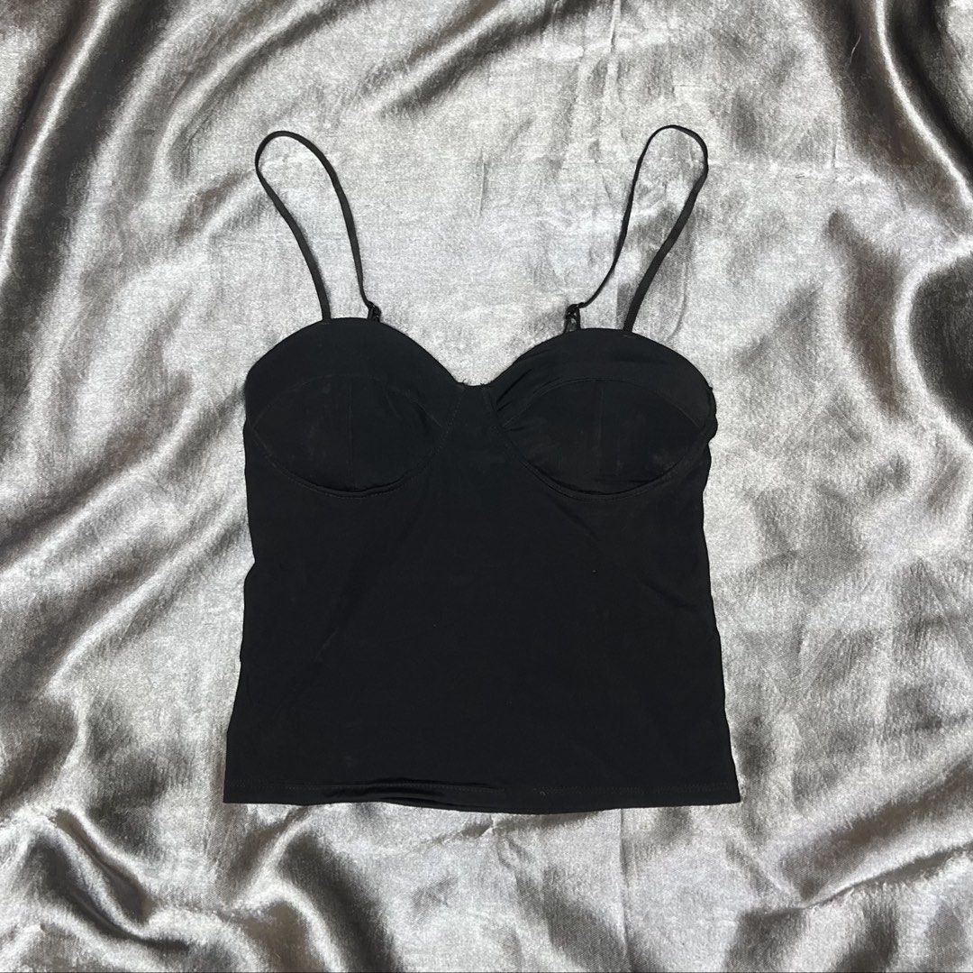 Black Corset Cami Top with Adjustable Straps (Category: Sleeveless) located in Cavite. Submitted by bellewii (Listing ID 1461069696, Image 1). Description: - Black cami top - Corset-style bust detail - Adjustable spaghetti straps - Fabric with a slight sheen - Versatile for layering or wearing on its own.