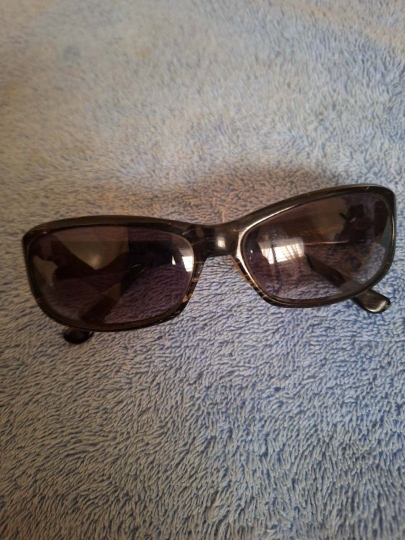Black Fashion Sunglasses (Category: Sunglasses & Eyewear) located in Malaybalay. Submitted by mags_sofia (Listing ID 1460958843, Image 1). Description: - Fashionable black sunglasses - Dark tinted lenses for sun protection - Glossy black frames - Subtle tortoiseshell pattern on arms - Ideal for everyday wear - Feel free to ask questions!.