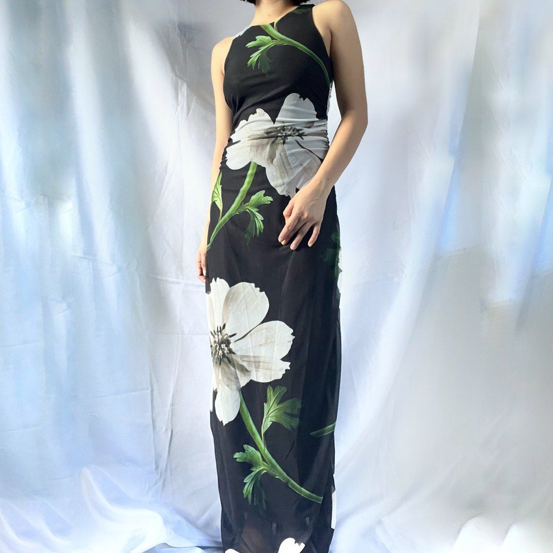 Black Floral Maxi Dress (Category: Dresses) located in Manila. Submitted by demi.rewears (Listing ID 1461068502, Image 1). Description: Black floral maxi dress. Sleeveless, high neck. Flowy fabric. Ideal for summer or events. Fits XS to Small Bust 28 to 32 inches Waist 24 to 26 inches Length 51.9 inches .