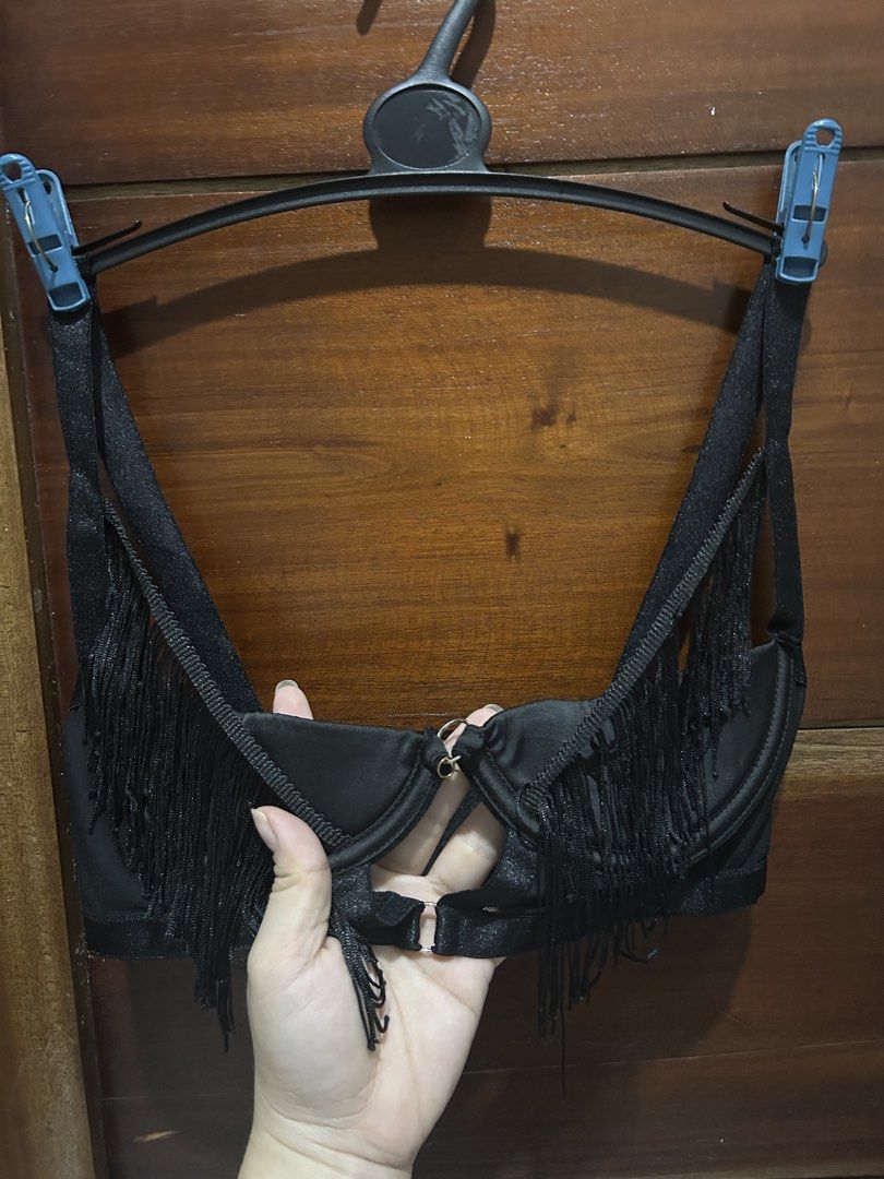 Black Fringe Bra by Olivia Chase (Category: Activewear) located in Quezon City. Submitted by enojasrena81355 (Listing ID 1461037903, Image 3). Description: - Brand: Olivia Chase - Color: Black - Size: S - Features: Fringe detailing, adjustable straps, front clasp closure - Style: Great for layering or as a statement piece - Adds flair to any outfit.