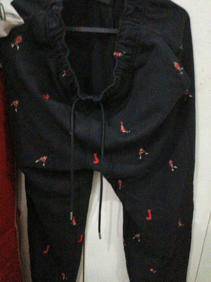 Black Jordan Pants with Red Jumpman Logo (Category: Joggers) located in Caloocan City. Submitted by mightyocean.04c3c0 (Listing ID 1460975710, Image 1). Description: - Black Jordan sweatpants - Features repeating red Jumpman logo and 'J' graphic all over - Elastic waistband with drawstring for a comfortable fit - Ideal for casual wear - A must-have for any Jordan fan ****Rare All Over Print Jordan Jogger..still nego..pls DM me🥰 M on tag but can 