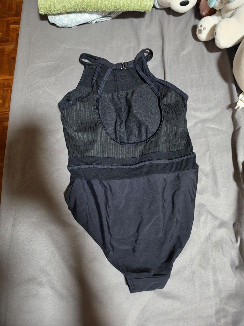 Black One Piece Swimsuit Padded (Category: Bikinis & Swimsuits) located in Quezon City. Submitted by snowflakes.specials (Listing ID 1460931366, Image 2). Description: Used once Thick cloth Issue: twisted strap sa pagtahi Overall, good condition XS.