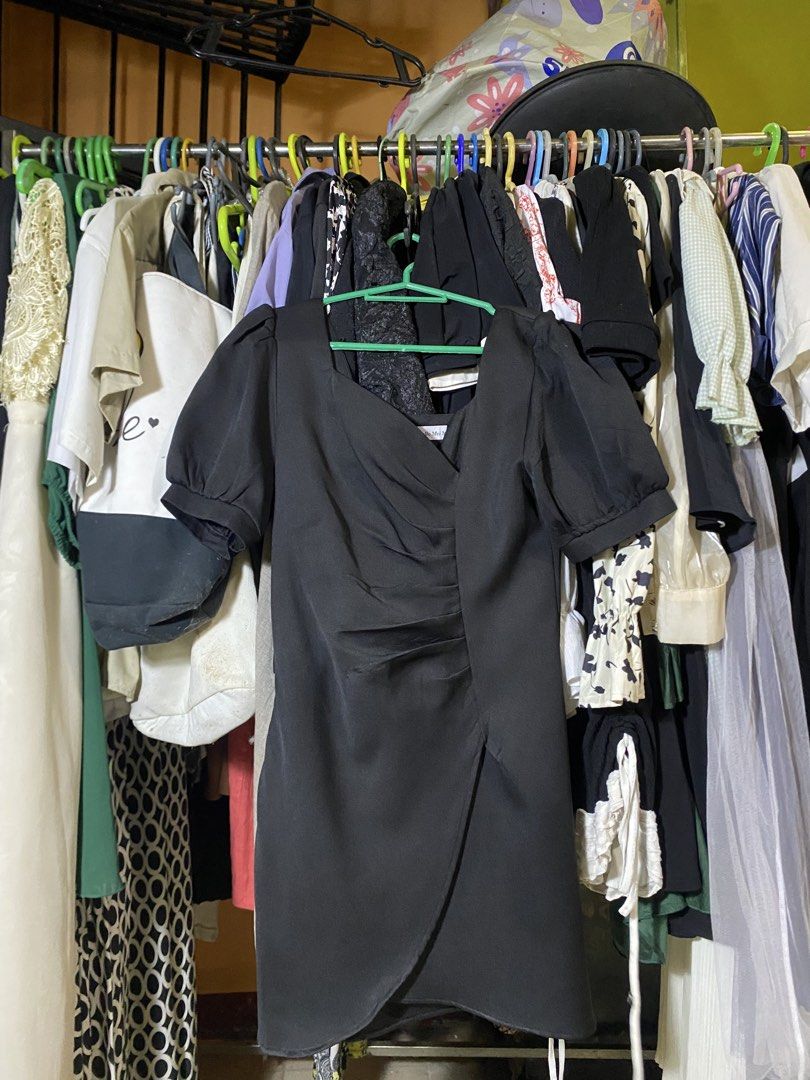 Black Puff Sleeve Ruched Wrap Dress (Category: Dresses) located in Caloocan City. Submitted by lienzonius (Listing ID 1461059790, Image 1). Description: - Elegant black dress - Stylish puff sleeves - Flattering ruched detail on the side - Chic wrap-style skirt - Deep V-neckline - Ideal for parties and night outs - Estimated size: Small to Medium.