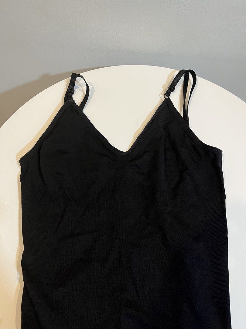 Black Ribbed Bodysuit with Adjustable Straps (Category: Others Tops) located in Manila. Submitted by xoshushi.dcltr (Listing ID 1460975406, Image 1). Description: - Black ribbed bodysuit - Adjustable spaghetti straps - Flattering V-neckline - Chic scoop back design - Convenient snap closure at bottom - Super comfortable and versatile - Ideal for everyday wear and layering.