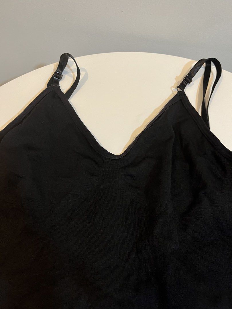 Black Ribbed Bodysuit with Adjustable Straps (Category: Others Tops) located in Manila. Submitted by xoshushi.dcltr (Listing ID 1460975406, Image 2). Description: - Black ribbed bodysuit - Adjustable spaghetti straps - Flattering V-neckline - Chic scoop back design - Convenient snap closure at bottom - Super comfortable and versatile - Ideal for everyday wear and layering.