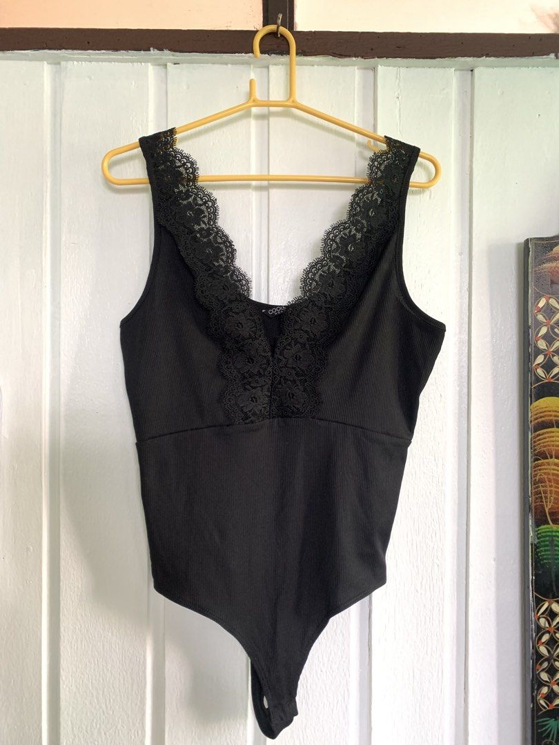 Black Ribbed Knit and Lace Body Suit (Category: Undergarments & Loungewear) located in Dagupan City. Submitted by delicatelibrary (Listing ID 1461073621, Image 1). Description: (Open to offers) Black Ribbed Knit and Lace Body Suit Size large Nice to style and layer with clothes. Light, comfy, and elasticized material.
