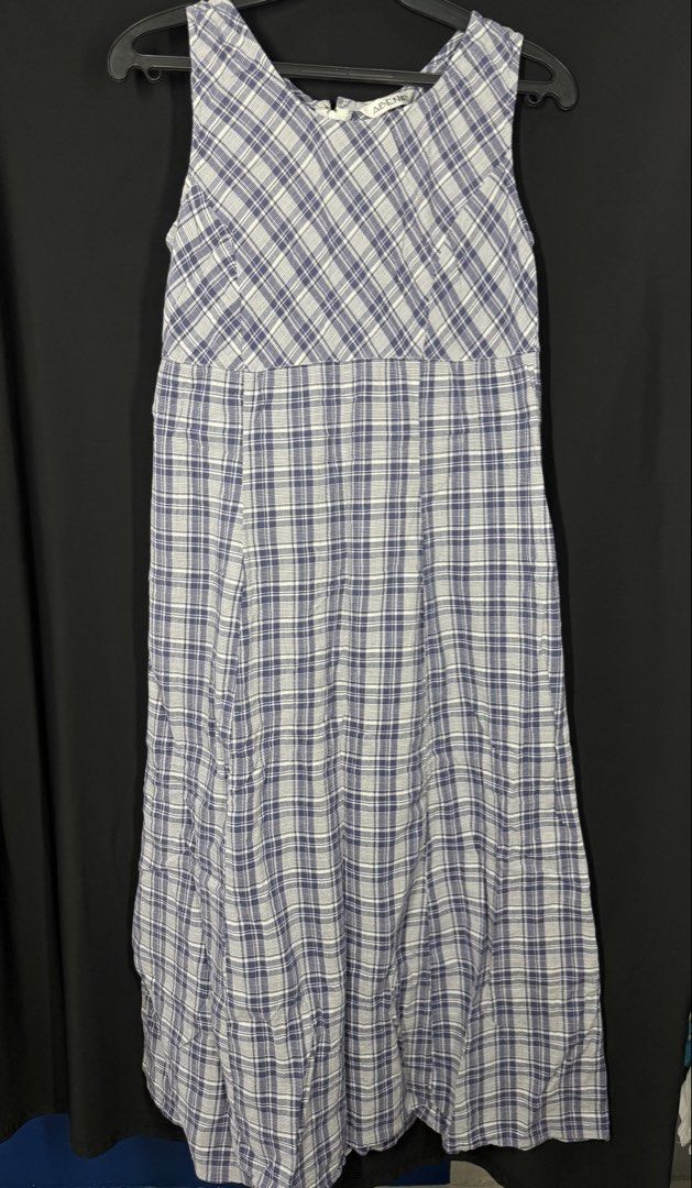 Blue and White Plaid Maxi Dress (Category: Dresses) located in Angeles City. Submitted by lesmiz24601 (Listing ID 1460965673, Image 2). Description: - Blue and white plaid maxi dress - Sleeveless with V-neckline - Empire waist with gathered skirt - Back zipper closure - Comfortable and breezy fabric - Ideal for casual outings and relaxed days.