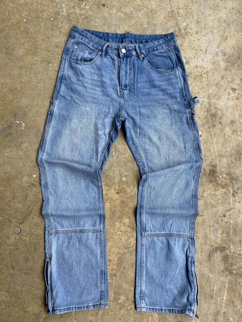Blue Denim Carpenter Jeans with Zippers (Category: Jeans) located in Lianga. Submitted by arwthrifts (Listing ID 1461038884, Image 1). Description: - Light wash blue denim - Carpenter style with hammer loop - Ankle zippers for adjustable fit - Classic five-pocket design - Relaxed fit - Ideal for everyday wear.