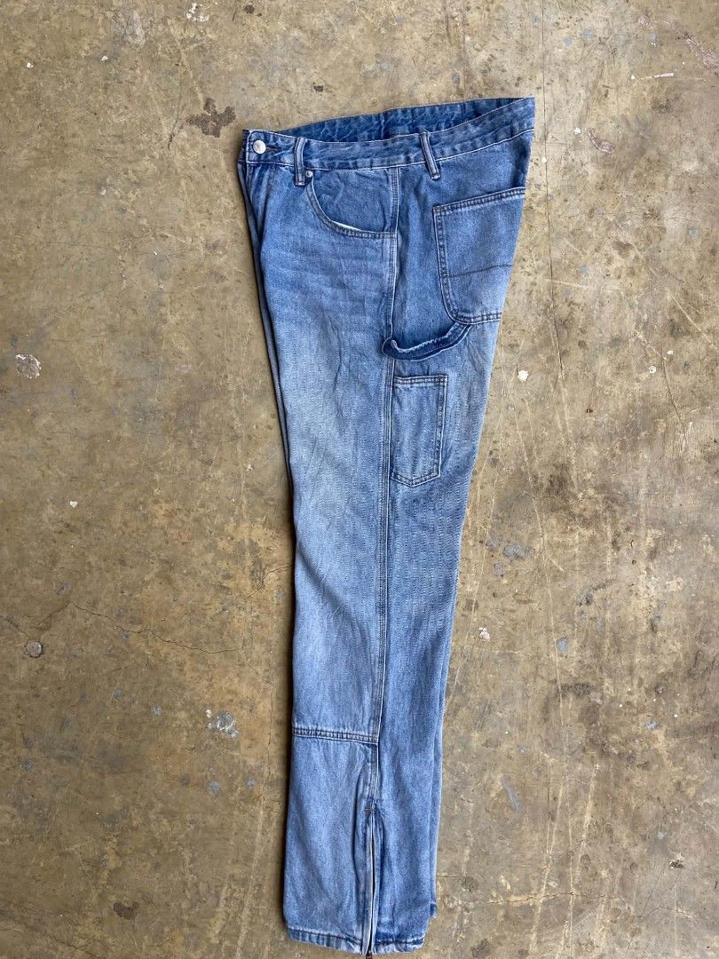 Blue Denim Carpenter Jeans with Zippers (Category: Jeans) located in Lianga. Submitted by arwthrifts (Listing ID 1461038884, Image 3). Description: - Light wash blue denim - Carpenter style with hammer loop - Ankle zippers for adjustable fit - Classic five-pocket design - Relaxed fit - Ideal for everyday wear.