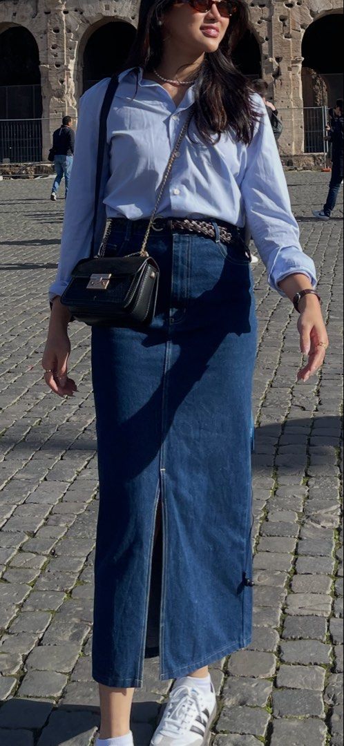 Blue Denim Maxi Skirt with Front Slit (Category: Skirts) located in Angeles City. Submitted by lesmiz24601 (Listing ID 1460967067, Image 1). Description: - Classic blue denim maxi skirt - Front slit for easy movement - Two back pockets and two front pockets - Button and zip closure - 27-29” waist - Ideal for casual wear and versatile styling.