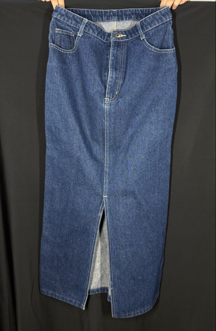 Blue Denim Maxi Skirt with Front Slit (Category: Skirts) located in Angeles City. Submitted by lesmiz24601 (Listing ID 1460967067, Image 2). Description: - Classic blue denim maxi skirt - Front slit for easy movement - Two back pockets and two front pockets - Button and zip closure - 27-29” waist - Ideal for casual wear and versatile styling.