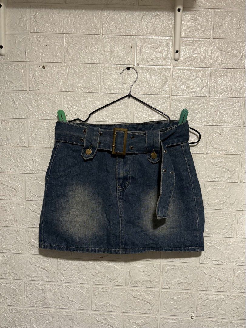 Blue Denim Mini Skirt with Belt (Category: Skirts) located in Manila. Submitted by _noname.shop (Listing ID 1461059083, Image 1). Description: - size 27-29 - Blue denim mini skirt - Includes matching belt - Front and back pockets - Distressed wash effect - Ideal for casual wear.