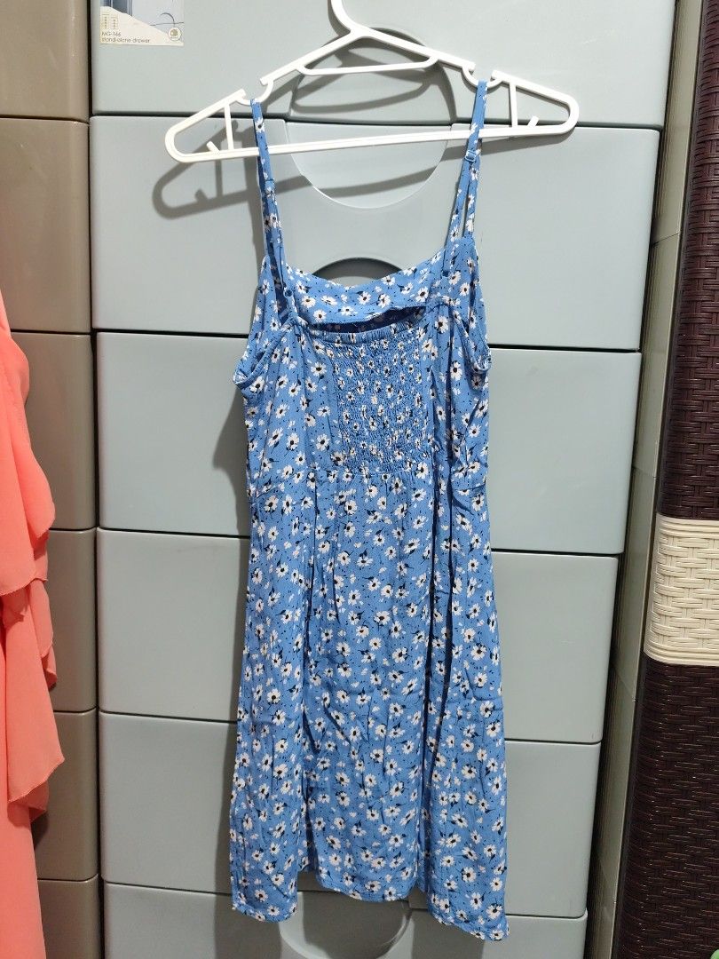 Blue Floral Spaghetti Strap Mini Dress (Category: Dresses) located in Antipolo. Submitted by d.inkworks.2024 (Listing ID 1460927558, Image 2). Description: - Cute blue mini dress - White floral print - Spaghetti straps - Smocked back for a comfy fit - Flattering A-line skirt - Ideal for casual outings or beach days - Easy to style with sneakers or sandals size: extra small.