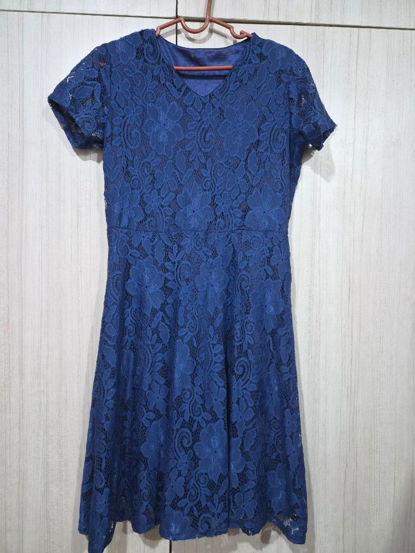 Blue Lace Short Sleeve Dress (Category: Dresses) located in Manila. Submitted by fayiefar (Listing ID 1461049502, Image 2). Description: - preloved navy blue lace dress - Short sleeves - Flared hem - Features an intricate floral pattern waist: 32 inc length: 37 inc.