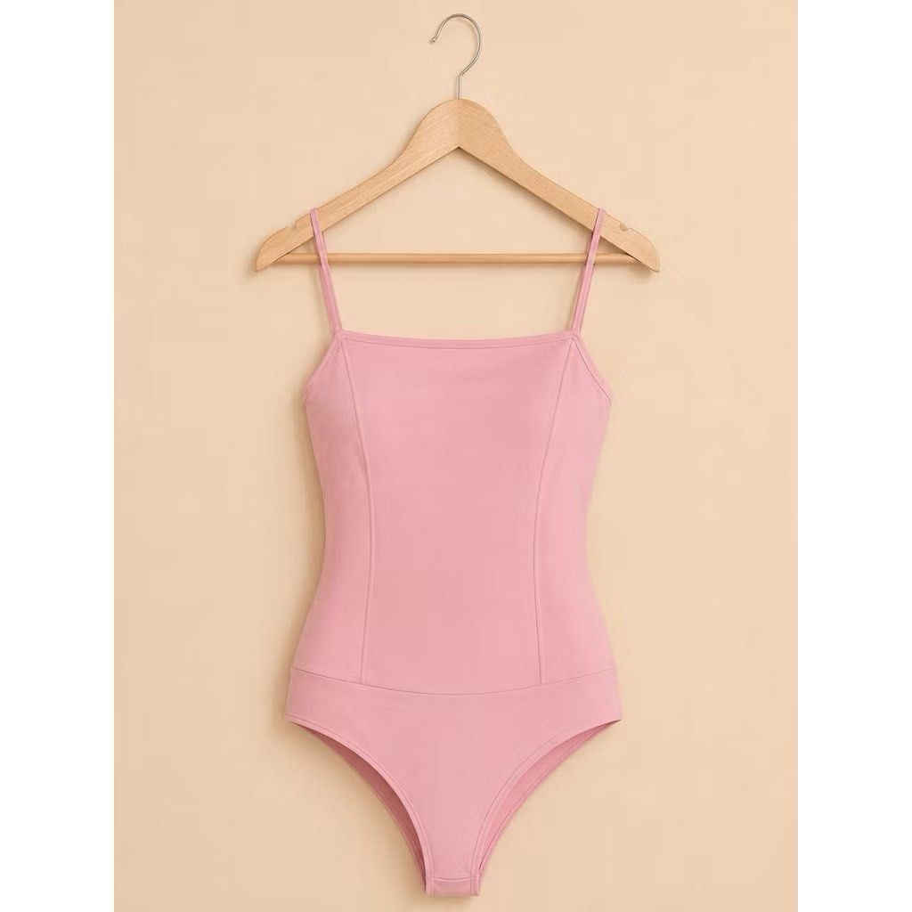 BNEW Pink Square Neck Spaghetti Strap Bodysuit (Category: Others Tops) located in Caloocan City. Submitted by curateddepot (Listing ID 1460935812, Image 1). Description: - Cute pink bodysuit - Square neckline - Thin spaghetti straps - Stretchy fabric for a comfortable fit - Flattering seams down the front and sides - Versatile for layering or wearing alone - Estimated size: Small to Medium.