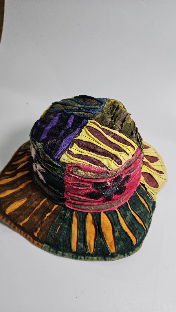 bohemian style patchwork bucket hat (Category: Hats & Beanies) located in Alfonso. Submitted by jbcamet (Listing ID 1461036092, Image 3). Description: - Unique handmade bucket hat - Colorful patchwork design - Features floral embroidery - Ruffled, leaf-like brim pattern - Adds a bohemian vibe - One size fits most.