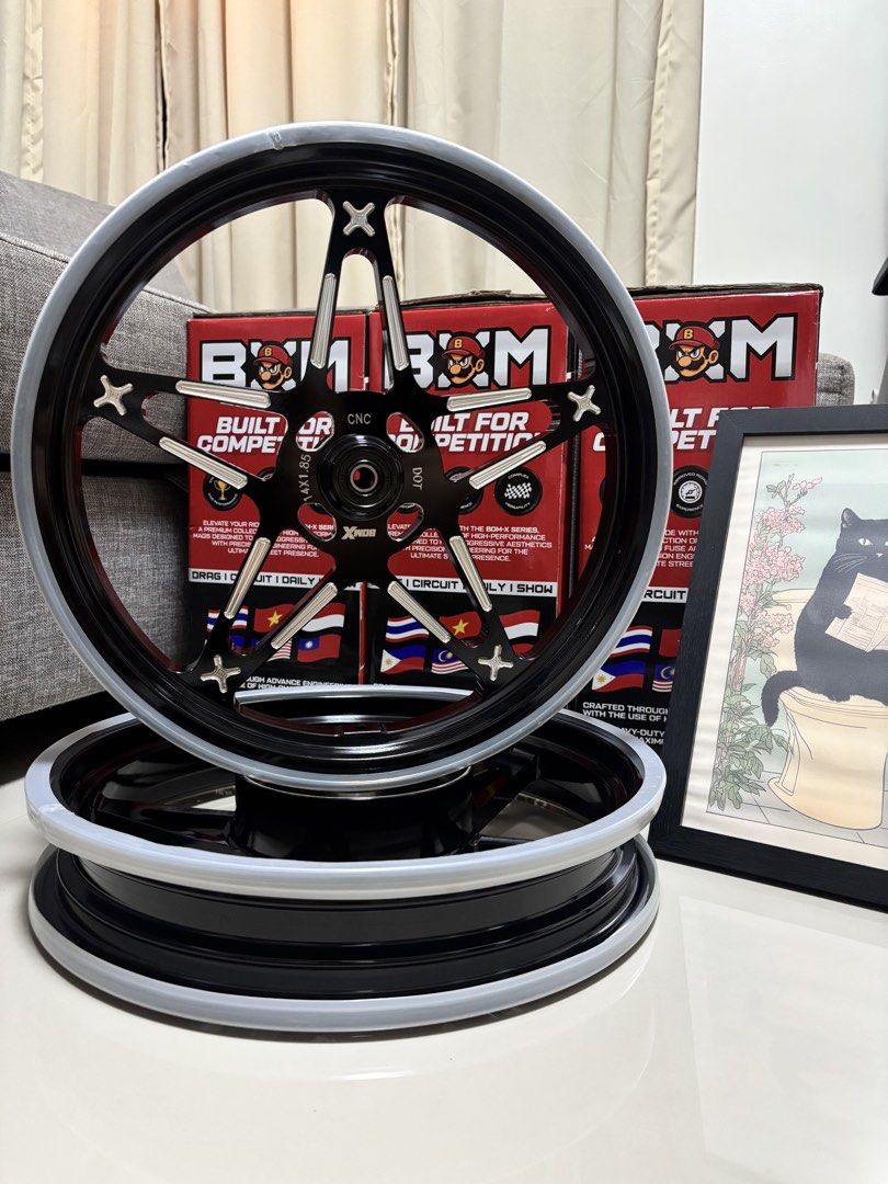 Bomx lynx v3 for honda click (Category: Other Motorcycles Parts and Accessories) located in Meycauayan. Submitted by retroselectionph (Listing ID 1460965955, Image 2). Description: BOM X Lynx CNC Mags for Honda Click 125/ 150 10pcs available on-hand SPECIFICATIONS: Brand: BOM X (Lynx Series) Fitment: Perfect fit for Honda Click V1, V2, V3, and V4 (4-Holes plug & play) Sizes: 14-inch standard street/sport setupCondition no: 100% Brand New in Box C