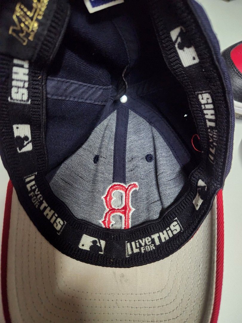 Boston Red Sox MLB Baseball Cap (Category: Caps & Hats) located in Quezon City. Submitted by amber___18 (Listing ID 1460986025, Image 3). Description: - Classic Boston Red Sox cap - Navy blue with red brim - Embroidered 'B' logo on the front - MLB logo on the side - Comfortable fit for game days or casual wear - Show your team pride!.