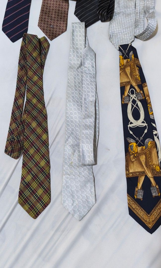Branded ties mula japan bundle (Category: Ties) located in Polomolok. Submitted by dkljapansurplus (Listing ID 1461064208, Image 3). Description: Branded tie mula japan 7pcs Burberry 1pc, Paul Smith 1pc Celine 2pcs, YSL 2pcs GianFrancoFerre 1pc.