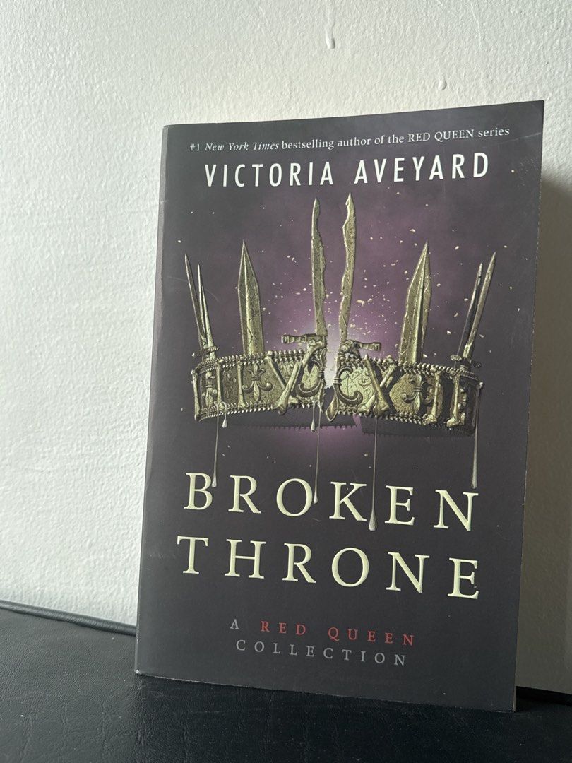 Broken Throne: A Red Queen Collection by Victoria Aveyard (Category: Storybooks) located in Mandaluyong City. Submitted by light.going (Listing ID 1461113630, Image 1). Description: - Brand new Red Queen Collection book by Victoria Aveyard. - Includes three brand-new short stories. - Features extras like maps, family trees, and flags. - Offers a new look into the Red Queen series characters. - Theme: Betrayal is the only certainty..