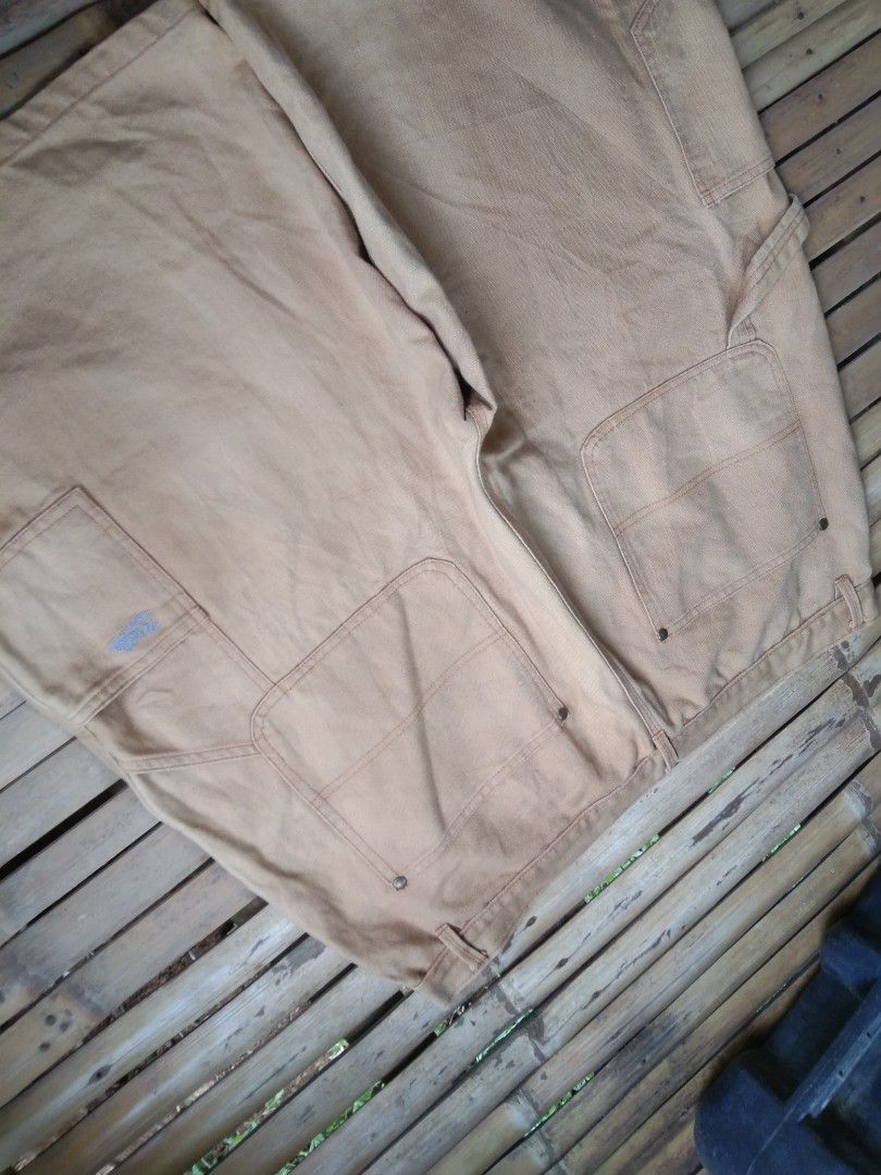 Brown double knee carpenter jorts (Category: Shorts) located in Aloran. Submitted by ingsikthrifting (Listing ID 1460928025, Image 3). Description: Brown double knee carpenter jorts Very excellent condition No issue just need wash Waistline 36 Length 24 Thighs 15 Hem 13.
