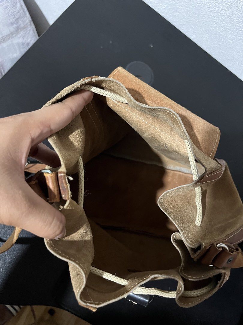 Brown Suede Buckled Sling Bag y2k whimsy (Category: Shoulder Bags) located in Tuguegarao City. Submitted by wear.lyunji (Listing ID 1461036400, Image 3). Description: spacious needs cleaning.