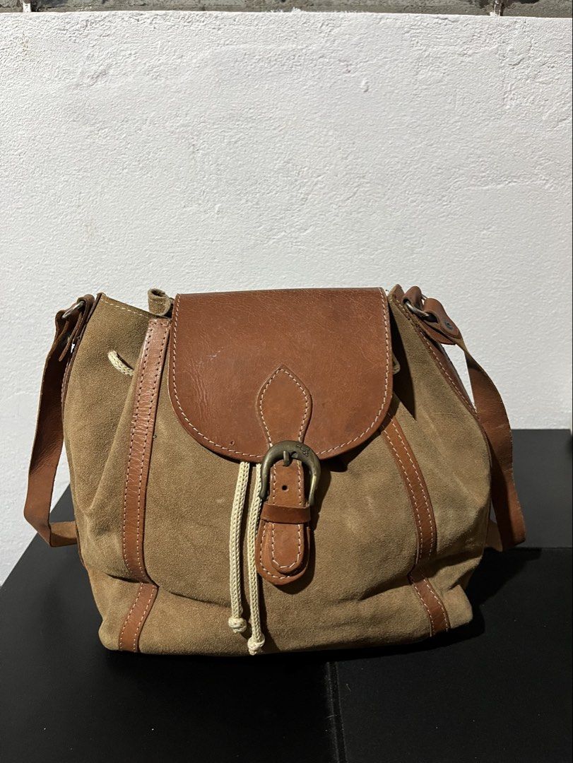 Brown Suede Buckled Sling Bag y2k whimsy (Category: Shoulder Bags) located in Tuguegarao City. Submitted by wear.lyunji (Listing ID 1461036400, Image 2). Description: spacious needs cleaning.