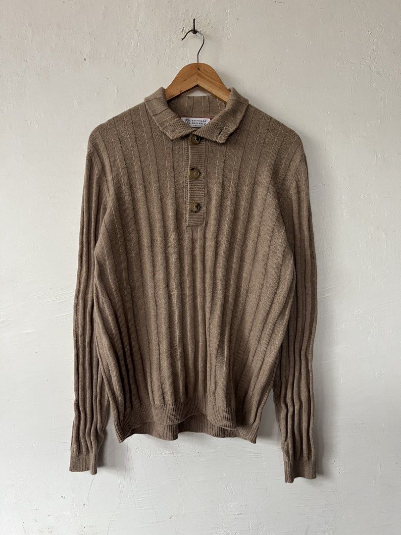 Brunello Cucinelli Cashmere Ribbed Polo Sweater (Category: Luxury Apparel) located in Las Pinas. Submitted by pawthrift (Listing ID 1460981663, Image 1). Description: - Brand: Brunello Cucinelli - Material: 100% Cashmere - Color: Taupe -Size Large to Xl 21.5 x 29 - Style: Ribbed Polo Sweater - Features: Button-up placket, Spread collar - Perfect for layering or wearing solo - Timeless wardrobe staple.