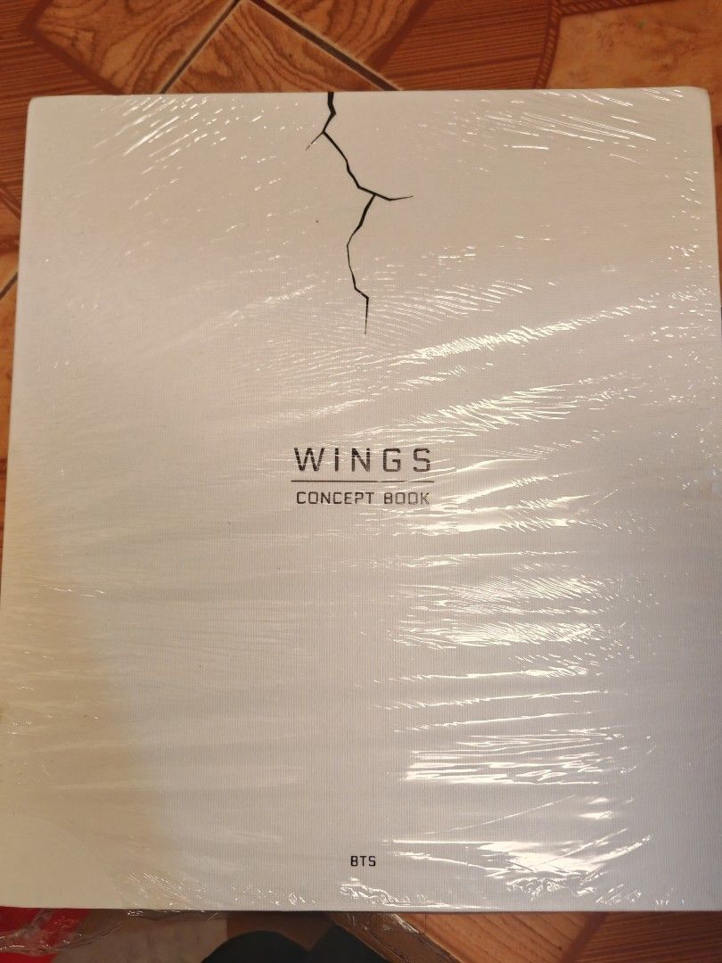BTS Wings Concept Book + ynwa poster (Category: K-Wave Merchandise) located in Dasmarinas. Submitted by hannah515 (Listing ID 1461057104, Image 1). Description: Price is still negotiable 💜 Comes with poster! No lenti pc included already sold separately 💙 With minimal flaws at outer cover at the edge due to storage but not easily seen. Can send more photos feel free to dm.