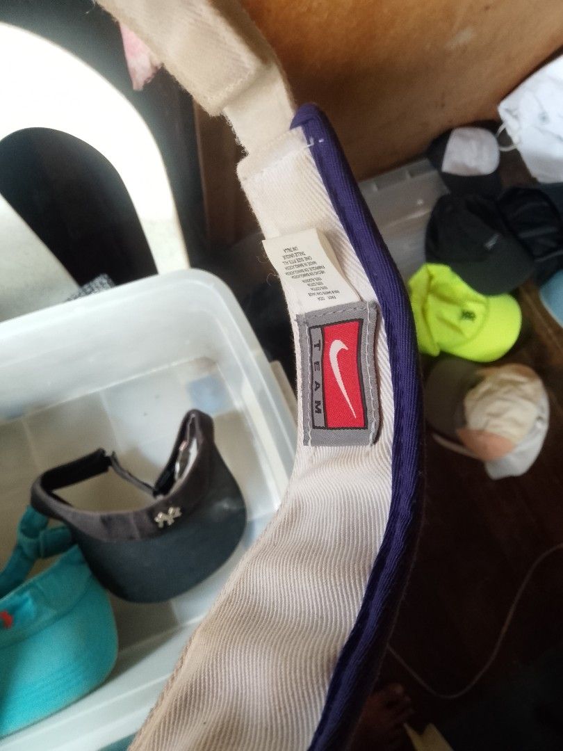 Bundle of 3 Caps and Visors (Category: Caps & Hats) located in Quezon City. Submitted by theoneshop1 (Listing ID 1460954702, Image 2). Description: - Bundle includes 3 headwear items: 1 teal cap, 1 white visor, 1 dark grey visor. - Teal cap features a vibrant orange logo. - White visor sports a cool blue wolf logo. - Dark grey visor has a classic 'NY' logo. - Ideal for sun protection and everyday casual wear. - Get all three for a great value!.